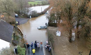 Axminster in Somerset was badly hit with cars stranded on flooded roads